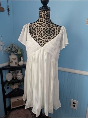 Brand new- Lulu's White Pleated Mini Dress with Flutter Sleeves